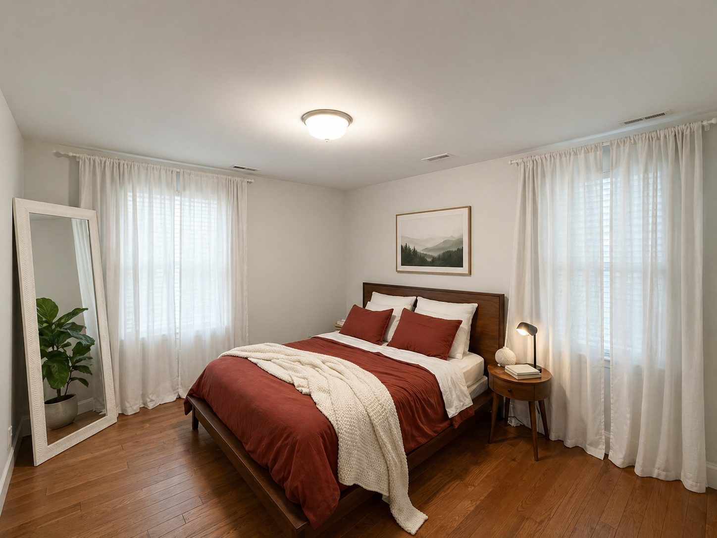 Two bedroom apartment bedroom at Brickwalk Village